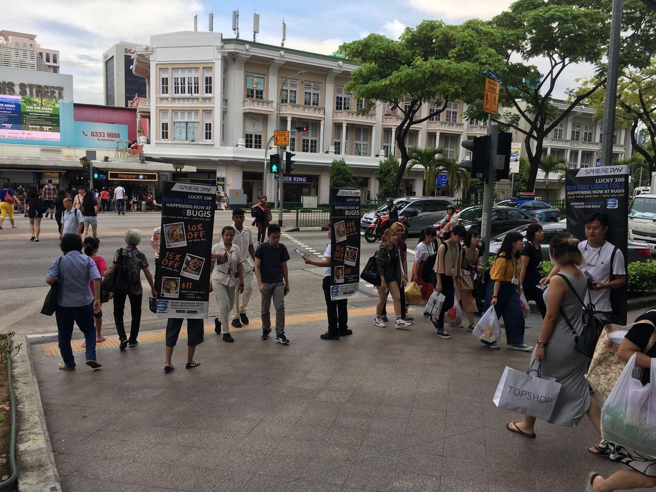 Hand-to-Hand Marketing in Singapore’s Busiest Spots with Street Flyer Distribution Promo
